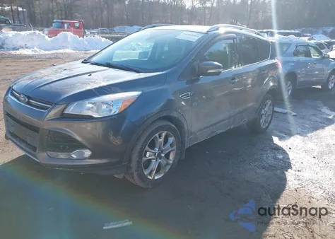 2016 Ford Escape Titanium z USA, uszkodzony, nr VIN 1FMCU9J97GUB85018